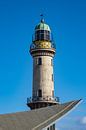 Der Leuchtturm in Warnemünde van Rico Ködder thumbnail
