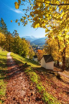 Walking in Garmisch-Partenkirchen in autumn with beautiful autumn colours, Maria Himmelfahrt parish 