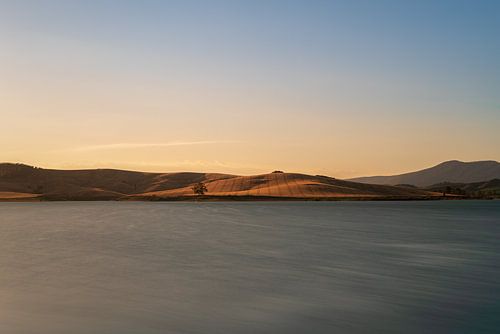 Vue du lac au coucher du soleil sur Robert de Boer