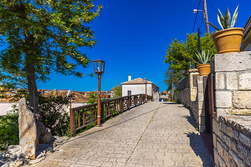 A traditional alleyway with a view in Afitos
