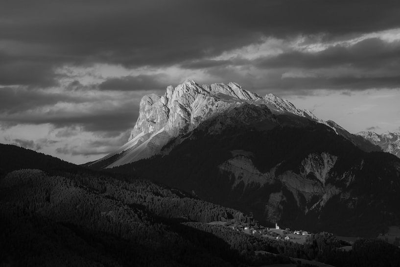 The village at the foot of its mountain by Julien Beyrath
