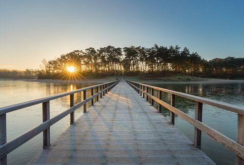 Bridge to island of Henschotermeer at sunrise
