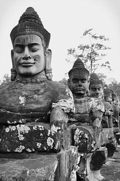 Figures at Angkor Wat, Cambodia by Lisa Gallo