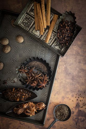 Spices on vintage baking trays by Saskia Schepers