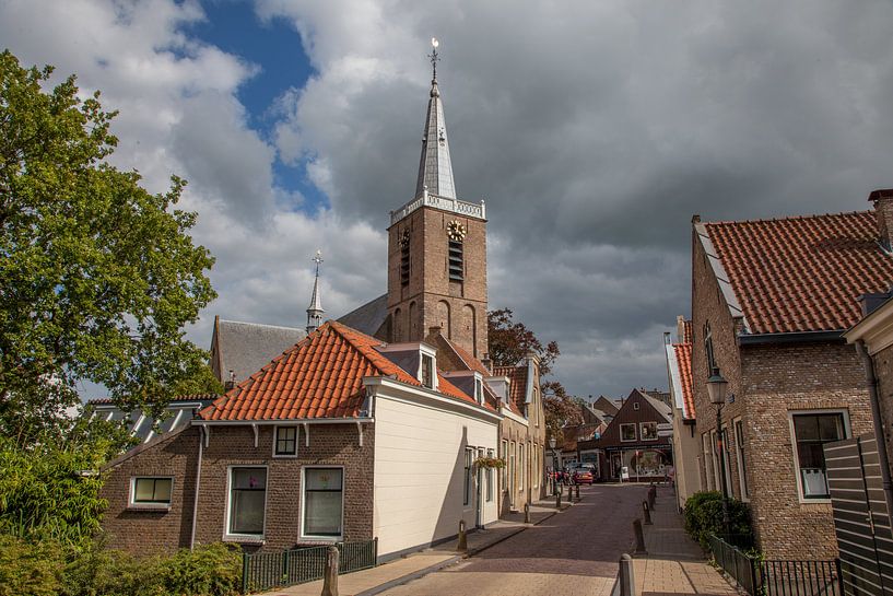 Kerk aan de dorpsstraat in Moordrecht, Nederland van Joost Adriaanse
