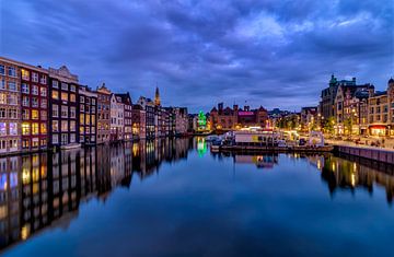 Houses at the Canal at Damrak Amsterdam