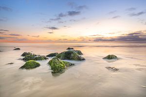 La plage d'Ameland au coucher du soleil sur Peter Heeling