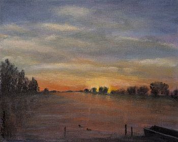 Sunset by the water