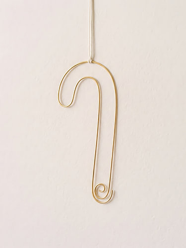 Minimalistische kerstkunst met gouden zuurstokken