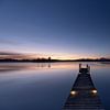 Morning stillness at the lake jetty in the first light by Christina Bauer Photos