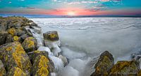 A winter sunrise from a pier in the Markerwaard