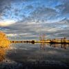 Réflexions sur l'eau dans Waterland, Hollande. sur Peter Bongers