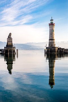 Bavarian lion and lighthouse harbour Linda at Lake Constance in Bavaria with Swiss Alps Germany by Dieter Walther
