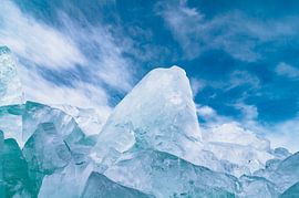 Shelf ice washed up on the shore of a frozen lake by Sjoerd van der Wal Photography