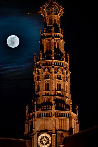 Full moon next to the big church in Haarlem