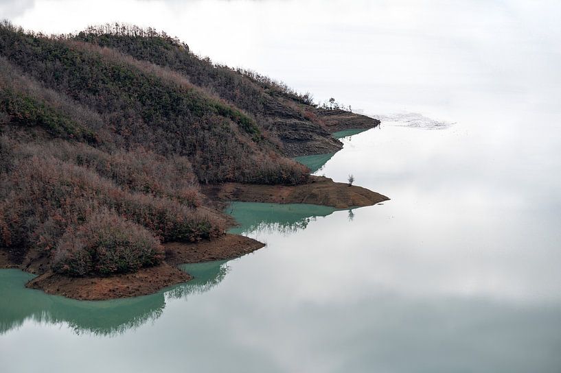 Mountain in lake by Werner Lerooy