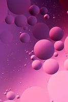 Olie in water, roze en paars