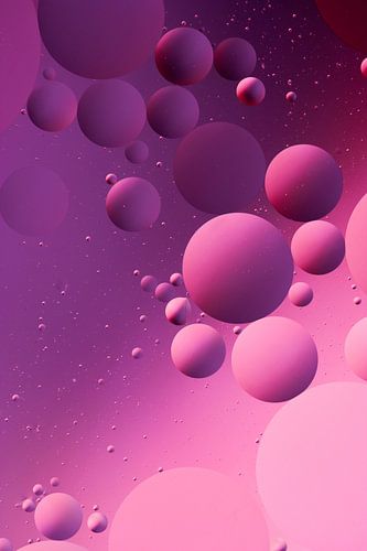 Olie in water, roze en paars