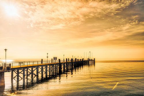 Jetty with sun in Kressbronn on Lake Constance by Dieter Walther