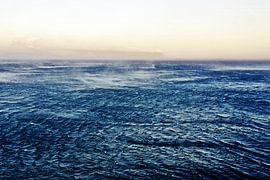 Stormy blue North Sea at sunrise by Werner Lehmann