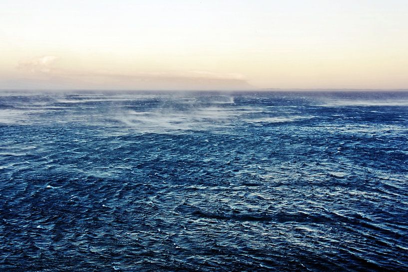 Stormy blue North Sea at sunrise by Werner Lehmann