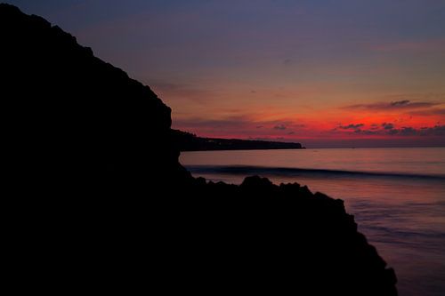 Ondergaande zon op Dreamland Beach Bali 