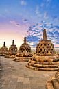 Zonsondergang over Stupa's Borobudur van Eduard Lamping thumbnail
