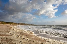 Beach in Zeeland with cloudy skies by anne droogsma