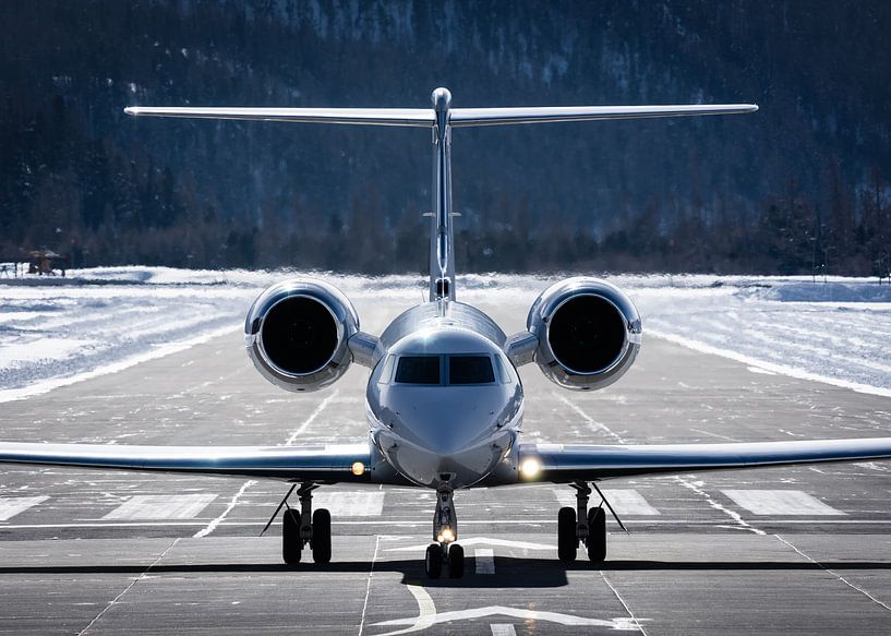 Business Jet - Gulfstream G550 - slowing down on the runway. by Dominik Kauer