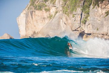 Yoyos Sumbawa surfing by Andy Troy