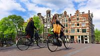 Cycling in Amsterdam van Harry Hadders thumbnail