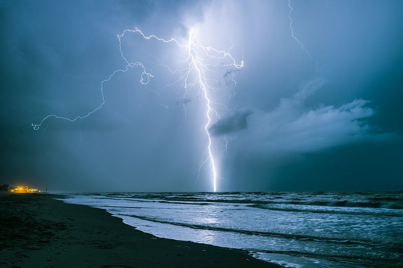 lightning over the sea by Menno van der Haven