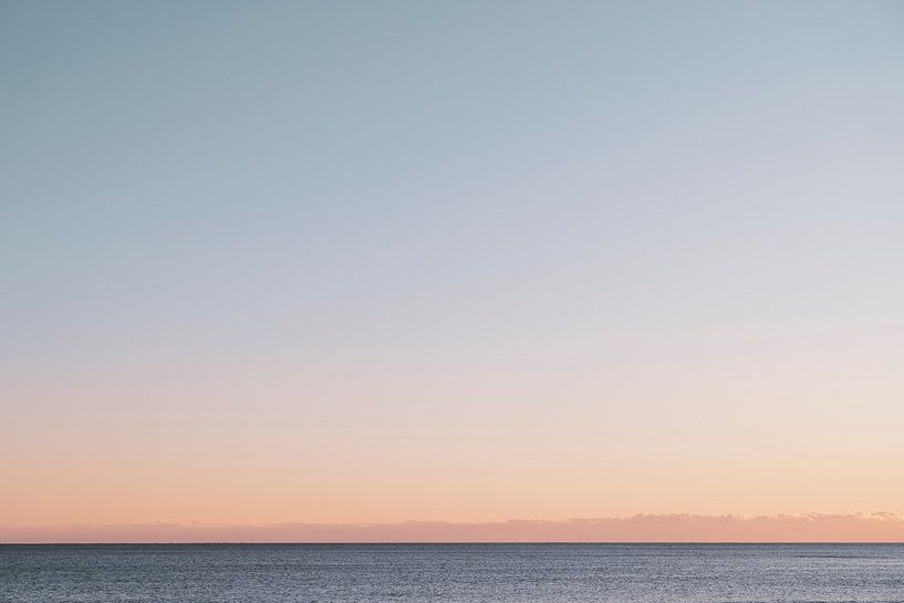 Blush pink sunset in winter on the island of Møn in Denmark - nature and travel photography by Christa Stroo photography