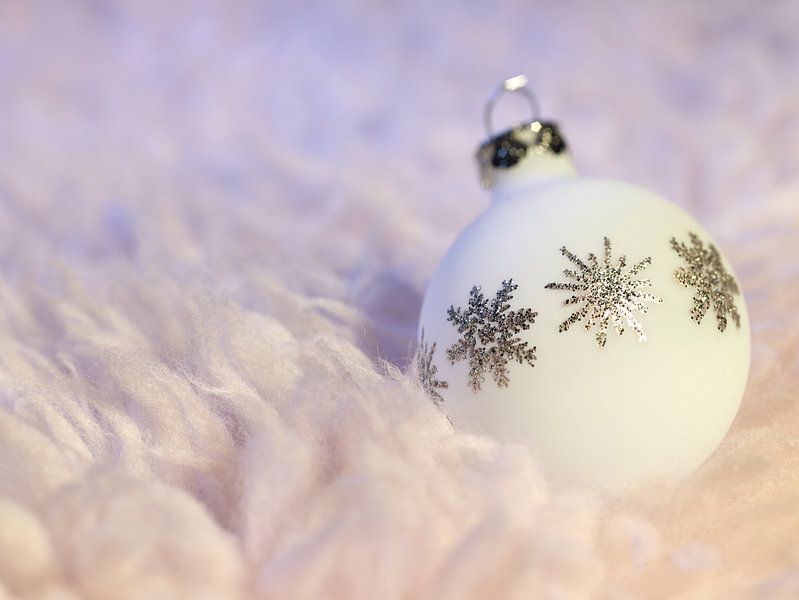 Christmas ball on fluffy fur by Achim Prill