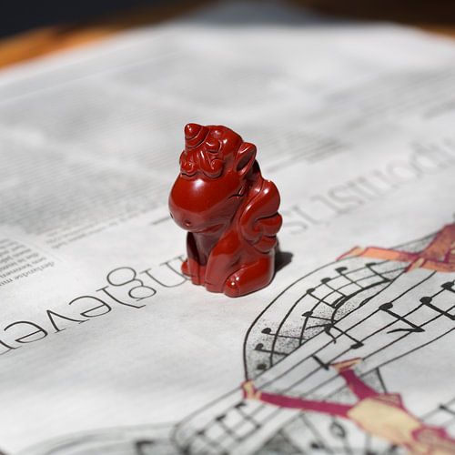 Reading a newspaper.