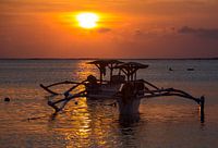 Traditional Balinese boats (Jukung) at sunset in Bali Indonesia