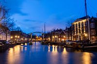 Schiedam in the evening, with a view of the boats and canal
