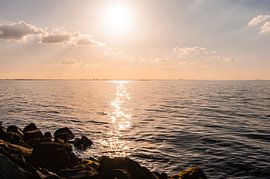 A shoreline in the sunset