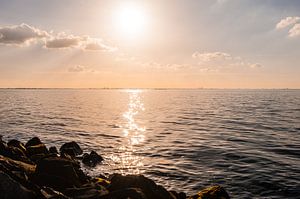 A shoreline in the sunset