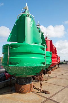 Colored navigation buoys in maintenance and storage by Tonko Oosterink