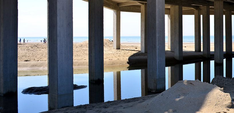 Reflecting concrete pillars and the sea by Lilly Wonderz