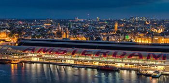 Amsterdam Central Station in evening light.