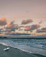 Surfers in de ochtendzon