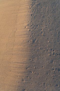 Traces sur la plage de sable 3