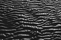 Waves in the sand.