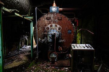 Rusty machine in old boiler room by Peggy Raemdonck
