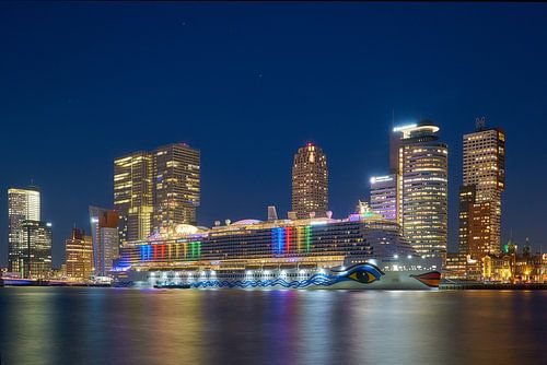 Skyline of Rotterdam with a cruise ship on the Nieuwe Maas