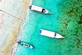 Traditional boats in Bali Indonesia by Eye on You