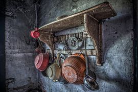 Kitchen rack in kitchen of abandoned farmhouse by Gerben van Buiten