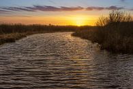 Laatste zonsondergang van 2021 van Rob Baken thumbnail